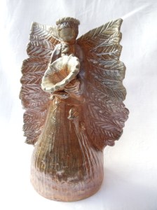 wood-fired Angel holding a morning glory $350.00